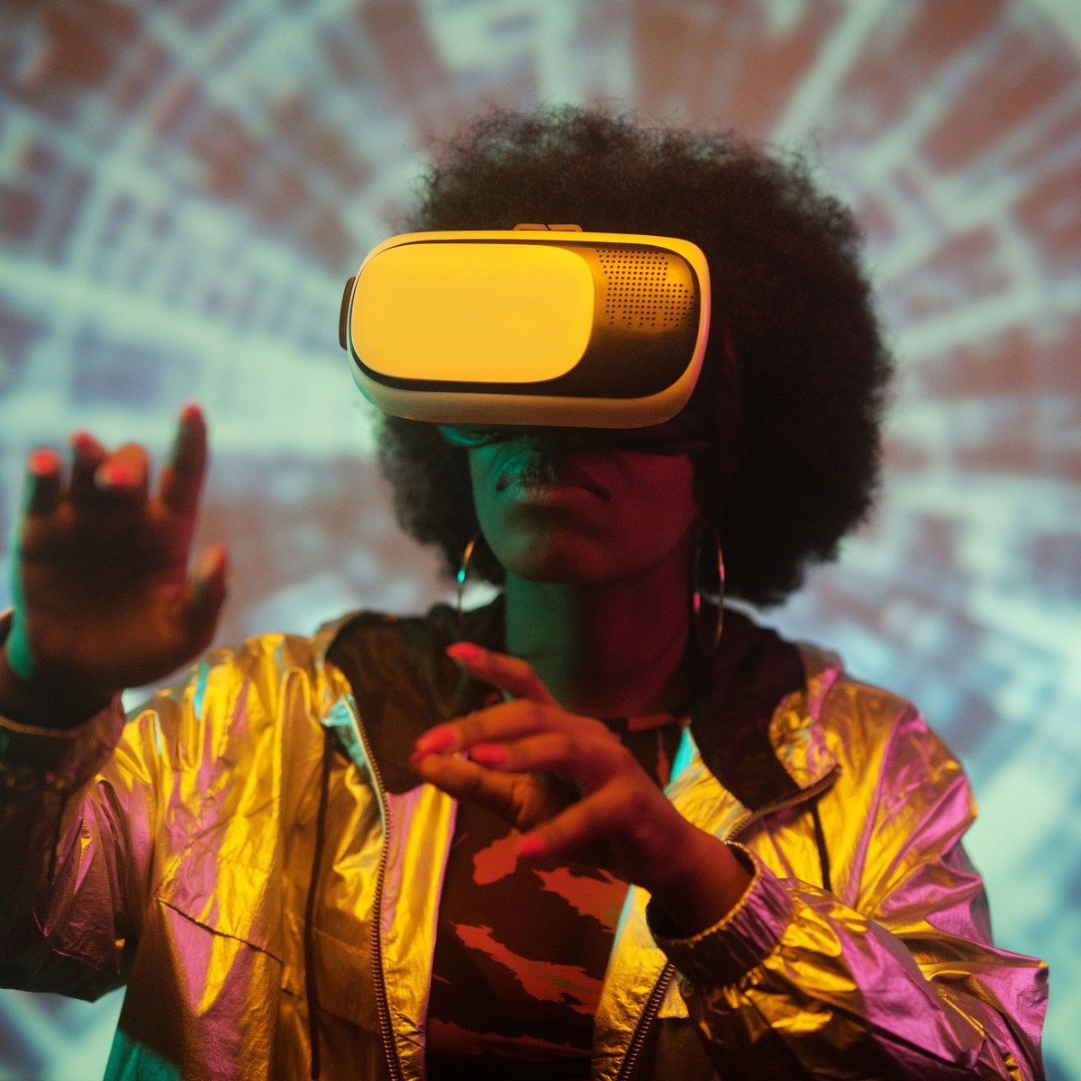 A person using a virtual-reality headset against a projected map